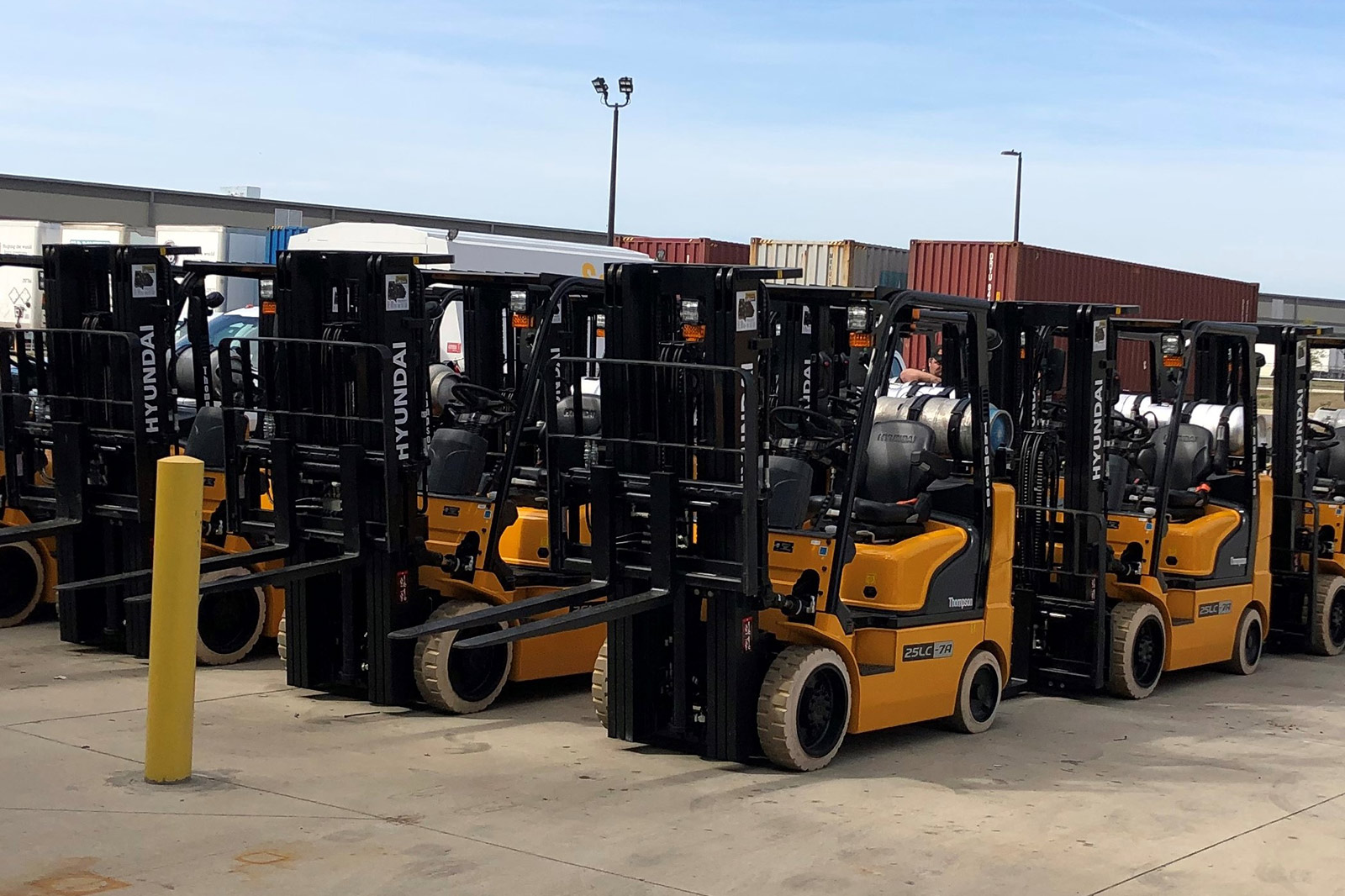Forklifts in a Lot