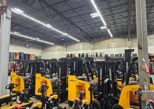 Fleet management solutions with Hyundai forklifts organized in a warehouse at Thompson Lift Truck